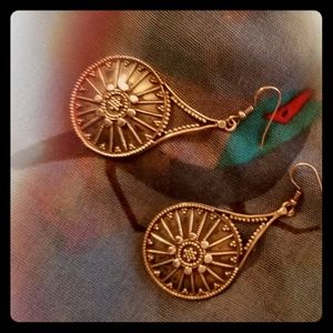 Silver disc dangling earrings